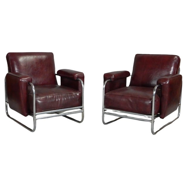 Nickel plated tubular steel lounge chairs with large Naugahyde upholstered cushions. These are built like tanks and...