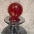 For your consideration, a vintage modern smoke glass decanter with red stopper. Attributed to Holmegaard. Unmarked....