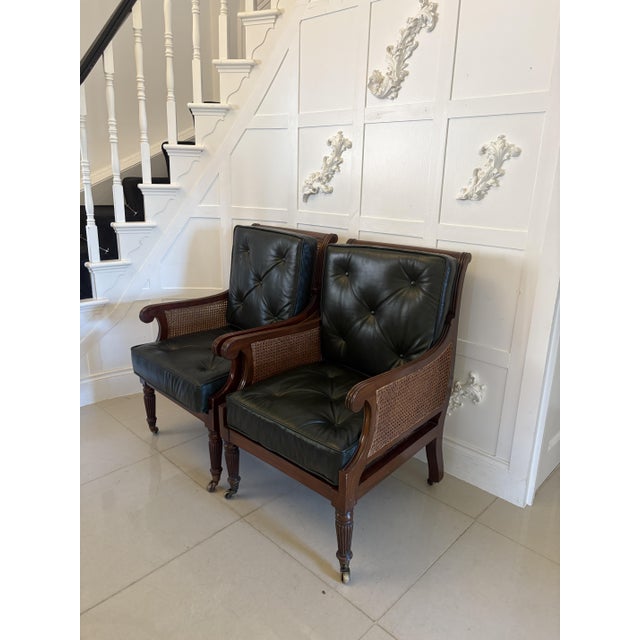 Pair of antique Edwardian quality mahogany library Bergere armchairs having a quality mahogany reeded back and arms...
