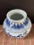 Vintage Chinese porcelain jar / vase features a hand painted repeating floral motif in vibrant royal blue on a white...