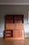 Danish teak secretary bookcase from the 1960s, attributed to svend aage rasmussen. The piece combines a drop-front desk...
