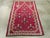 This early 20th century Turkish Ghiordes rug, measuring 3' 5" x 5' 2", features a striking tribal design infused with rich...
