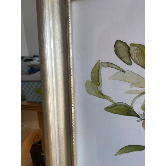 Add a fresh and timeless touch to your space with this charming orange tree watercolor print, beautifully presented in a...