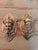 Striking pair of vintage H. Vankruck cast brass wall pockets, featuring highly dimensional theatrical Pierrot or jester...
