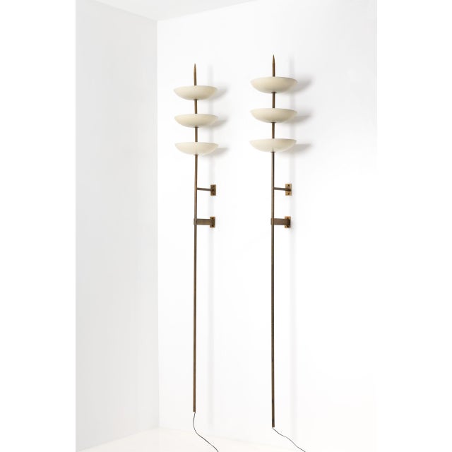 This rare pair of mid-century sconces produced by Stilnovo in the 1950s exemplifies the refined elegance and forward-...