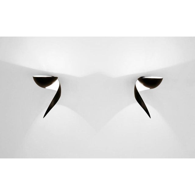 Wall lamp model 'flame wall lamp' designed by serge mouille in 1962. Manufactured by editions serge mouille in france. The...