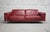 Very comfortable leather sofa with outside tubular metal frame. Manufactured by Natuzzi, Italy. This piece has an...