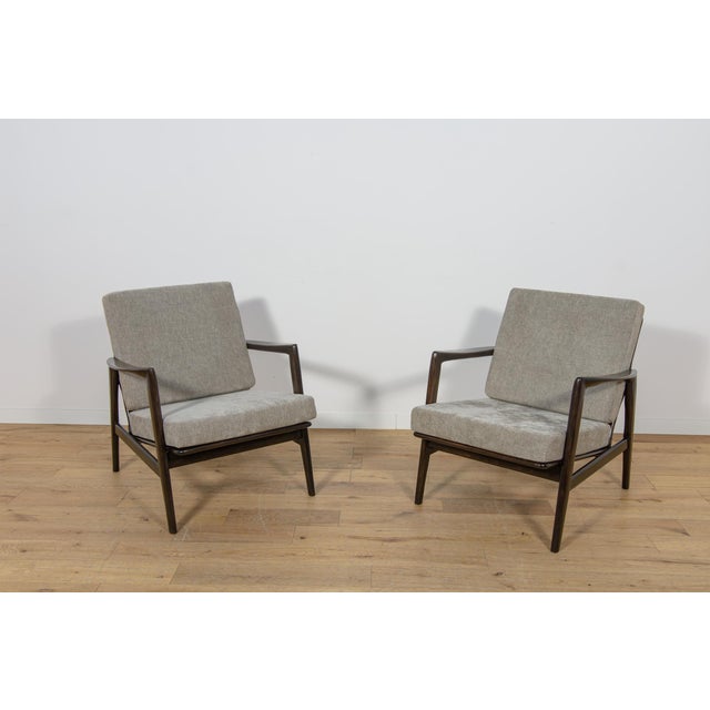 This pair of armchairs Model 300-139 was produced by the Polish company Swarzędzka Furniture Factory in 60s.The armchairs...
