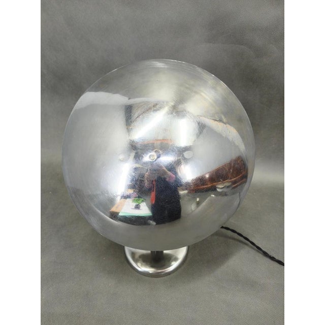 Original Bauhaus table lamp produced in Czechoslovakia during the 1930s. This sculptural piece features a wide domed...