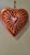 Invite rustic romance into your home with this vintage heart-shaped copper mold, a timeless accent piece brimming with...