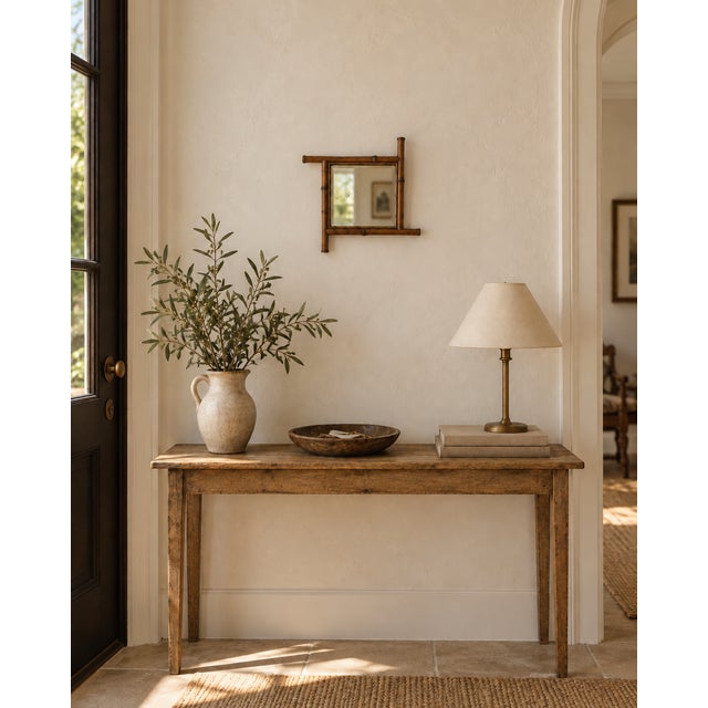A little bit Riviera, a little bit campaign, and very easy to love. This petite vintage French faux bamboo mirror has all...