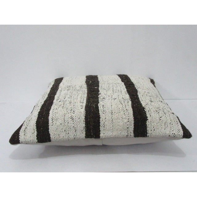 Handmade decorative pillow cover made from a vintage Turkish kilim rug. Backed with good quality cotton fabric. Pillow...