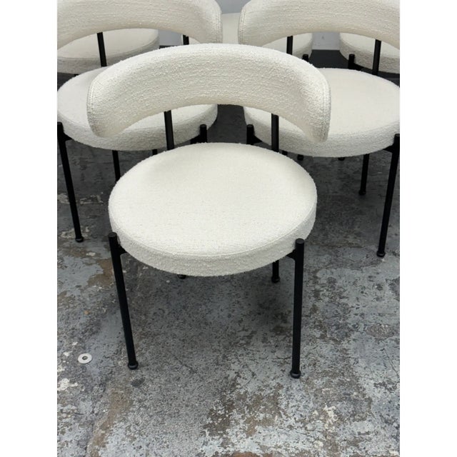 Design Plus Gallery presents a Set of Six Inesse Dining Chairs by Omar De Biaggio for CB2. These ivory dining chairs...
