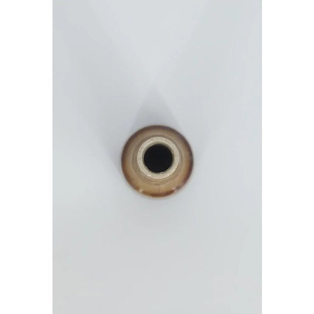 This miniature, collectible stoneware vase was designed by Gunnar Borg for the Swedish manufacture Höganäs Keramik during...