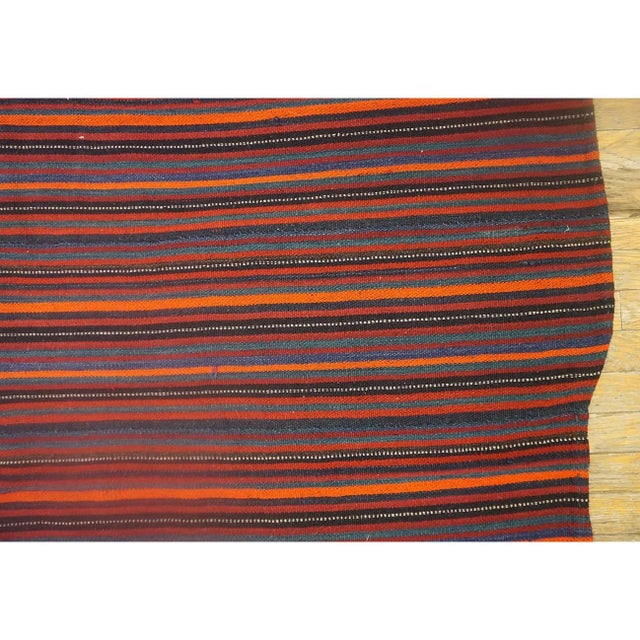 this mid-20th-century Turkish Decorative textile is a beautiful testament to Anatolian tribal weaving craftsmanship....
