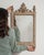 Here is a mirror, its natural carved oak frame with crest, small the first thing to catch the eye. The piece dates to...