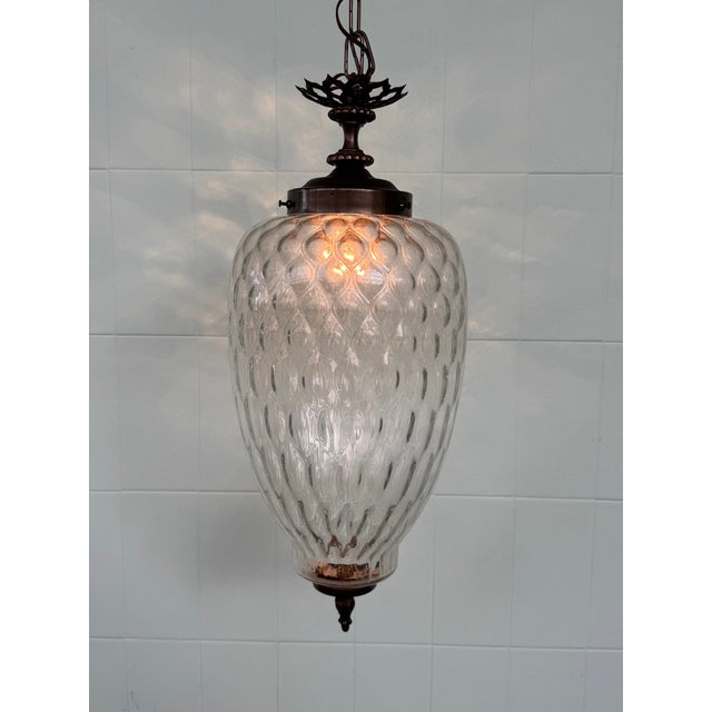 Antique textured glass lantern chandelier, a vintage Italian piece dating back to the 1960s. It features a pressed or...