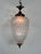 Antique textured glass lantern chandelier, a vintage Italian piece dating back to the 1960s. It features a pressed or...