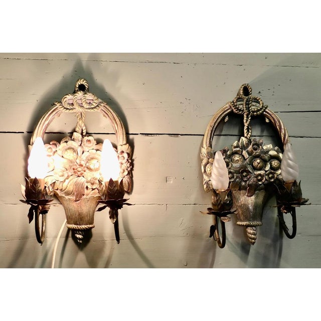 This is a very attractive large pair of french carved wall lights they each have 2 sconces hanging from a Basket of...