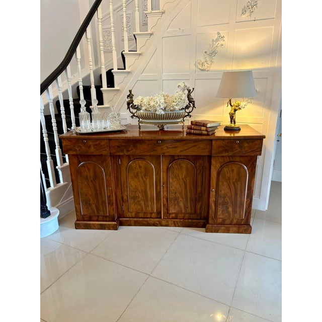 Antique Victorian outstanding quality figured mahogany sideboard having a wonderful quality figured mahogany top with 3...