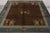 An antique Peking rug originating from China circa 1920-1930. Hand-knotted wool, the 8x9 rug exhibits exemplary Chinese...