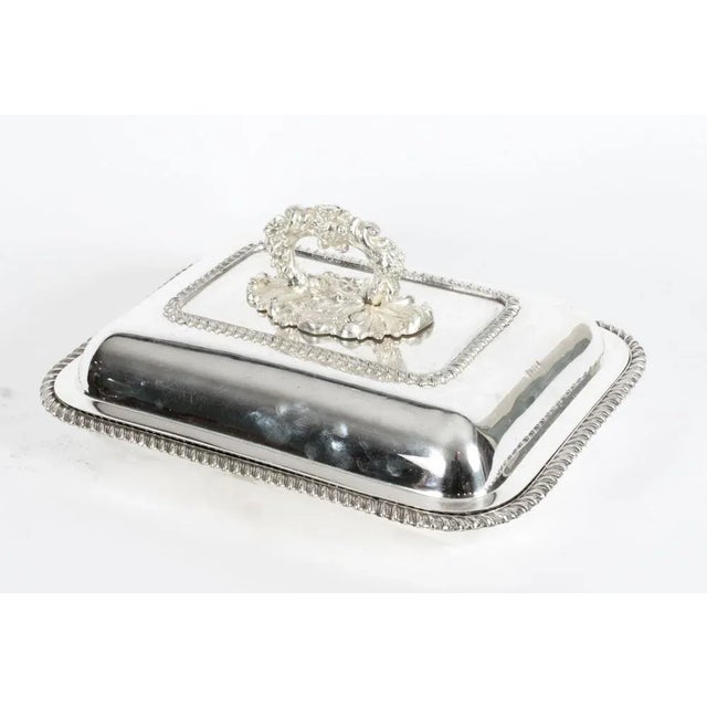 This is an exquisite and rare antique pair of English silver plated entree dishes, bearing the makers mark of Matthew...