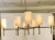 Original Retail $2600, Stylish Arteriors Modern Vintage Silver Remington Chandelier, white cylinder shades, showroom floor...