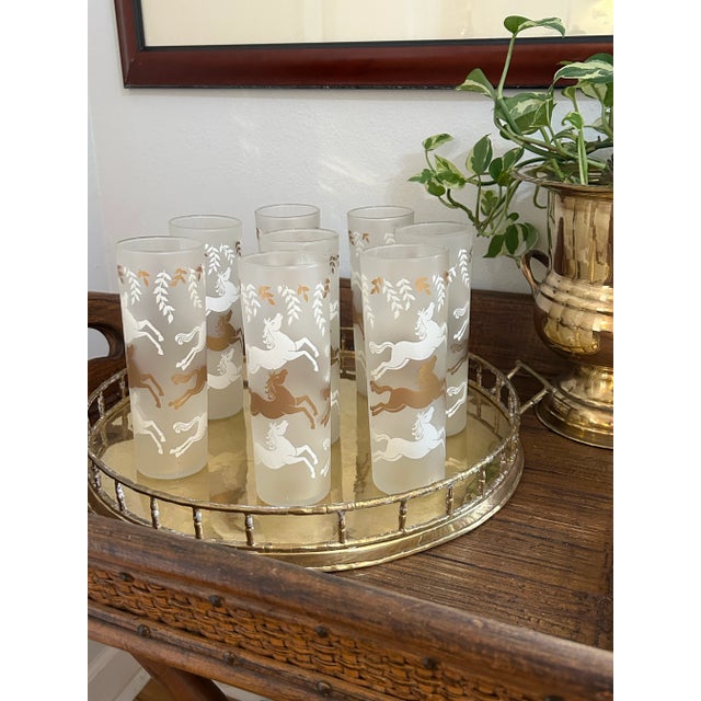 Vintage glassware at its best! This set of 8 highball or Collins glasses are the “Cavalcade” pattern from Libbey. The...