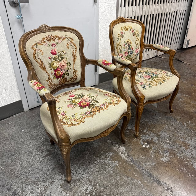 Design Plus Gallery presents a Pair of Antique Louis XV Armchairs with Needlepoint Upholstery. This elegant pair of...