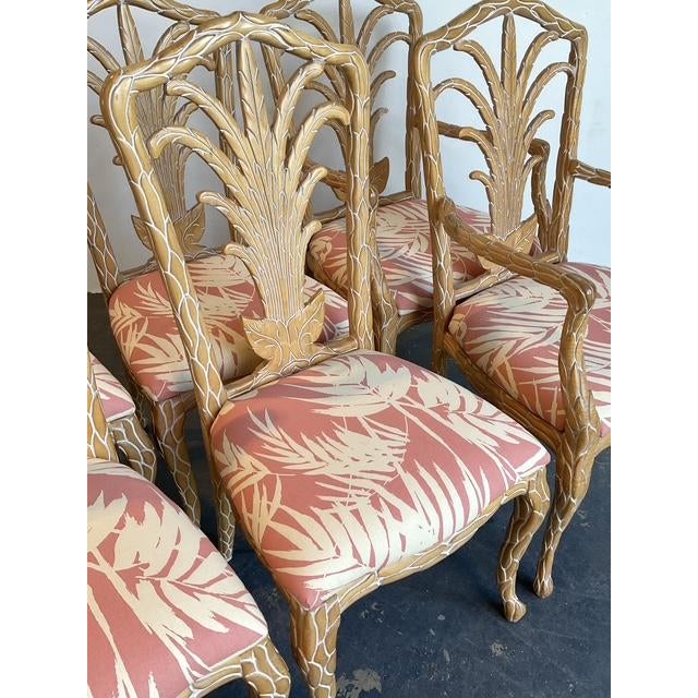 This exceptional set of six vintage dining chairs is a masterclass in Hollywood Regency glamour, epitomizing the...