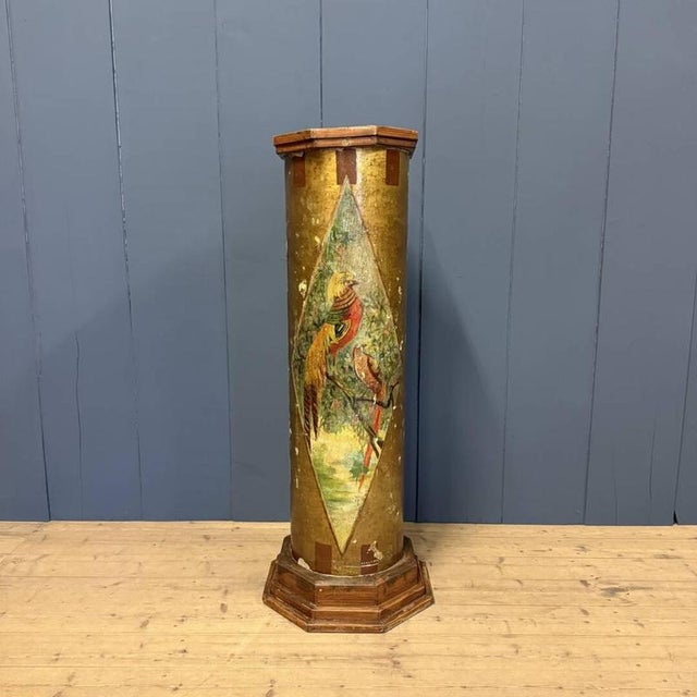 Magnificent large antique column painted with Golden Pheasants, originating from Belgium, circa 1920. This pillar was made...