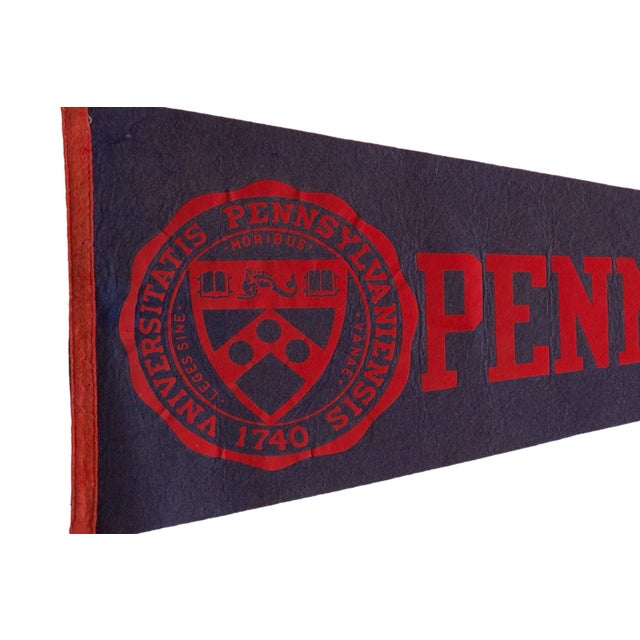 Vintage University of Pennsylvania felt flag pennant circa 1960. This piece of mid-century memorabilia from PA University...