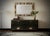 A strong brass color frame reach the eye of the beholder leaving him entranced; of Murano multi color art glass wall...