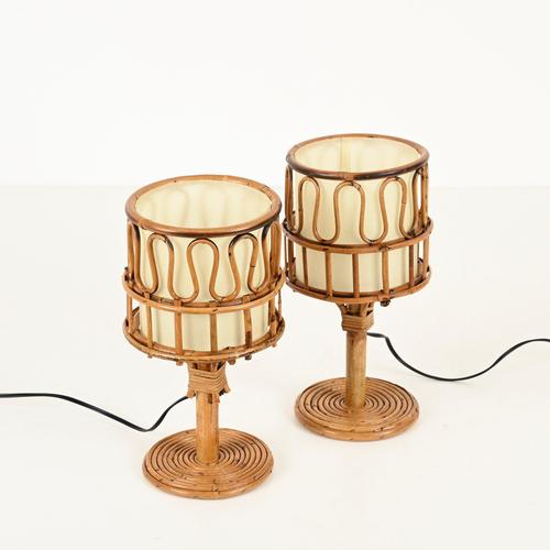 Marvelous and very unique pair of mid-century organic table lamps entirely handcrafted from curved rattan and hand-woven...