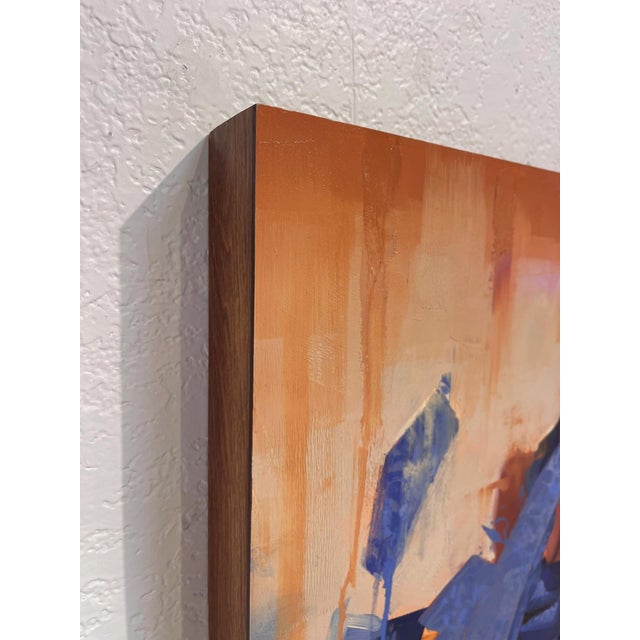 Contemporary Expanse by Ryan Morse | Oil on Panel Woman in blue attire with floral patterns against a warm background For Sale - Image 3 of 5