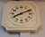 Vintage German Wall Clock in Cream-Colored Ceramics with Black Hands and Digits with Orange Point from Kienzle, 1970s, in...