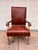 Dark camel colored leather upholstery and crackling almond-cream paint define this beautiful office chair. The leather...
