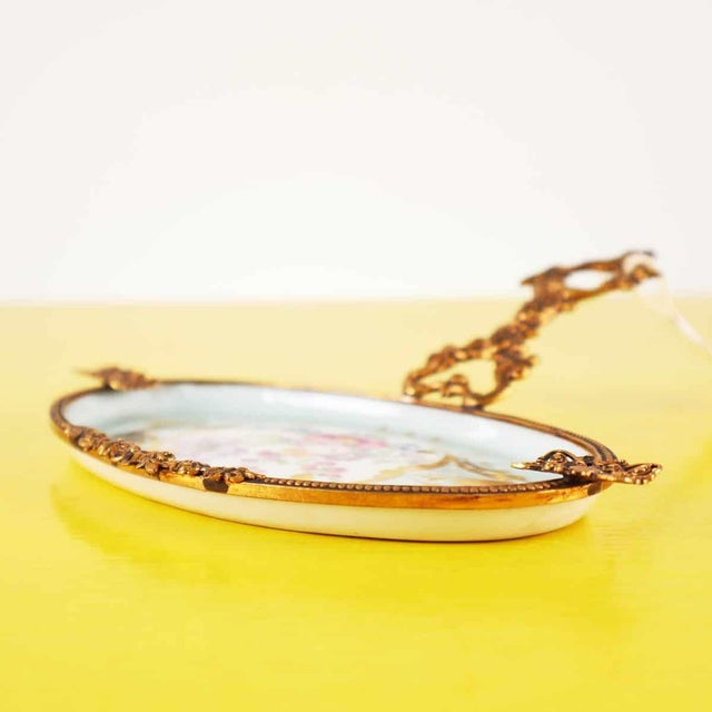 Limoges Ceramic Ashtray with Handle, in Good conditions. Designed 1960 to 1969 This piece is attributed to the mentioned...