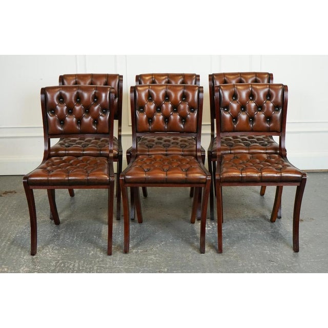 Stunning Set of Six Vintage Fully Restored Chesterfield Aged Cigar Brown Leather Dining Chairs. A very good looking and...