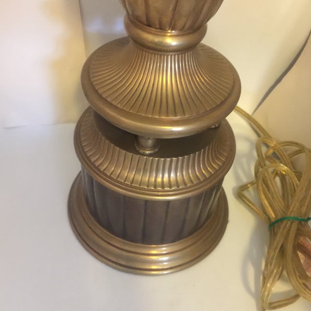 Beautiful brass lamp by Chapman in excellent condition with original patina. A very heavy solid lamp that would be at home...