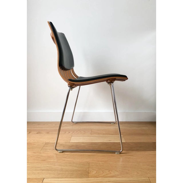 Iconic, Mid-century Danish modern Scandia side chair by Hans Brattrud for Hove Mobler. Bent teak wood back and seat with...