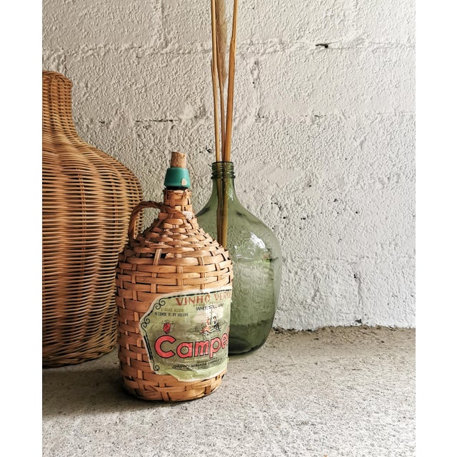 This wine balloon was made in Portugal in the 1950s for the white wine of the CAMPELO company. The balloon has a capacity...