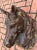 Moulded zinc horse head originally with gilt finish then repainted in brown, circa 1860. This originally hung outside a...