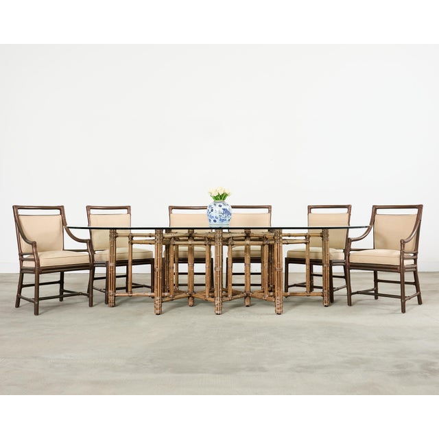 Fantastic set of ten rattan target design dining chairs featuring a bronzed aged finish in the California coastal organic...