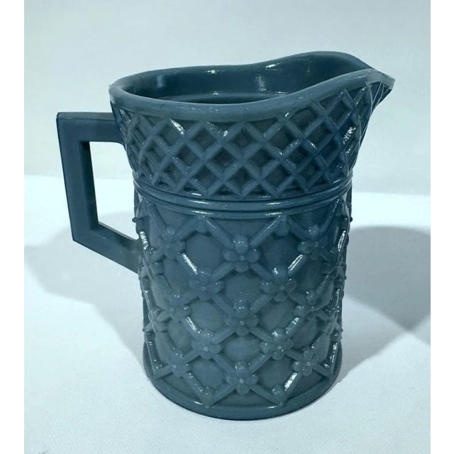 Westmoreland sugar bowl and creamer set in the "Diapered Flower" pattern. The most gorgeous blue! The sugar measures 4.75"...