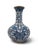 Small Chinese Cloisonne vase. Brass with white enamel background showing vibrant cobalt blue and turquoise flowers and a...