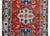 A wonderfully bold vintage Anatolian Turkish rug with three large central floral medallions, each with leaves and flowers,...