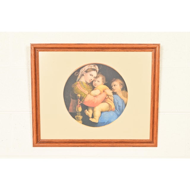 A beautiful framed print entitled "Madonna della Seggiola" Originally painted in Italy circa 1510s by Italian High...