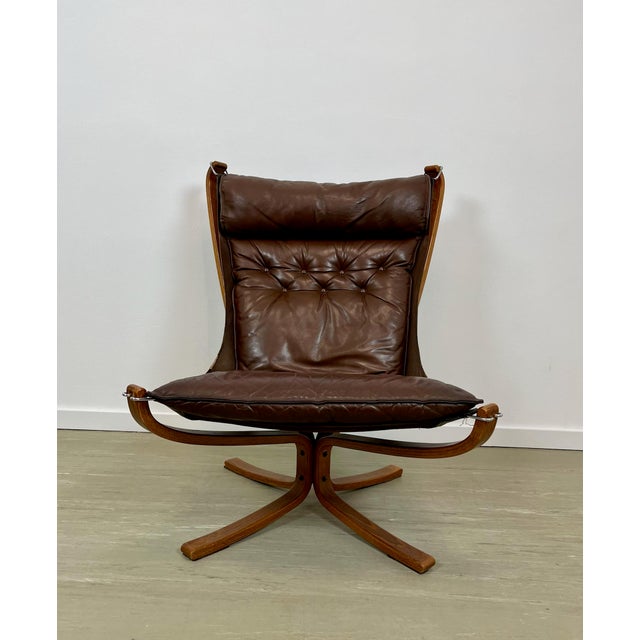 Designed by Sigurd Resell in the 1970s and produced by furniture manufacturer Vatne Møbler the Falcon Chair is one of the...