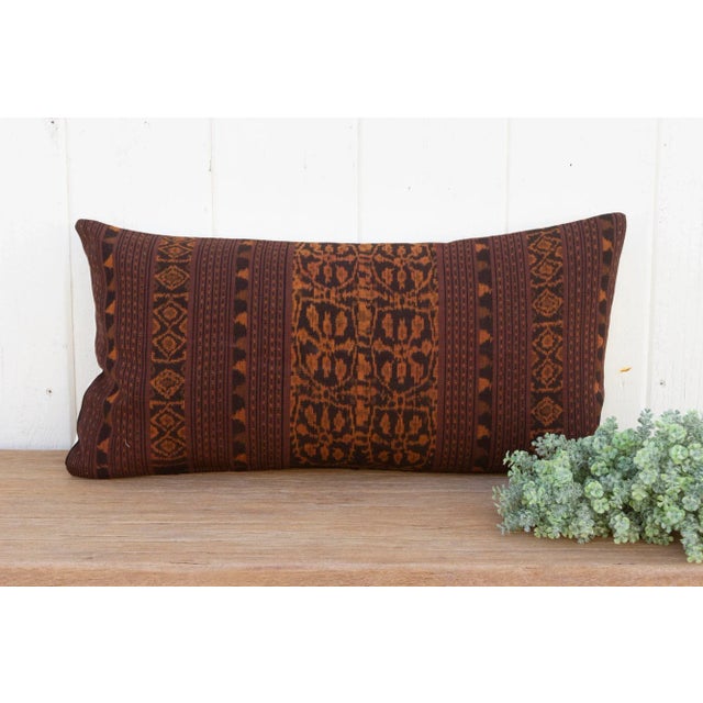A magnificent antique Indonesian ikat ceremonial throw, now made into a one of a kind pillow. This antique ceremonial...
